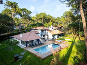 Villa de luxe avec piscine chauffée, jacuzzi, sauna au cœur de la forêt des Landes - FR-1-791-24